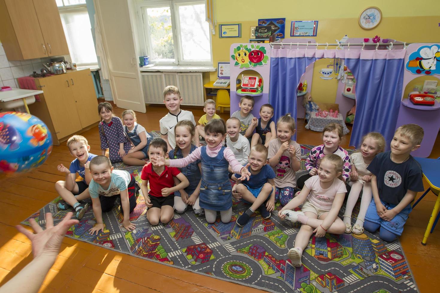 Many children in kindergarten. A group of six year old boys and girls. photo