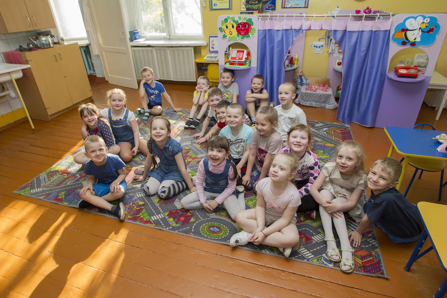 Belarus, the city of Gomil, April 25, 2019.Open day in kindergarten. Many children in kindergarten. A group of six year old boys and girls. photo