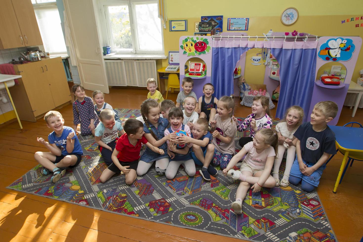 Belarus, the city of Gomil, April 25, 2019.Open day in kindergarten. Many children in kindergarten. A group of six year old boys and girls. photo