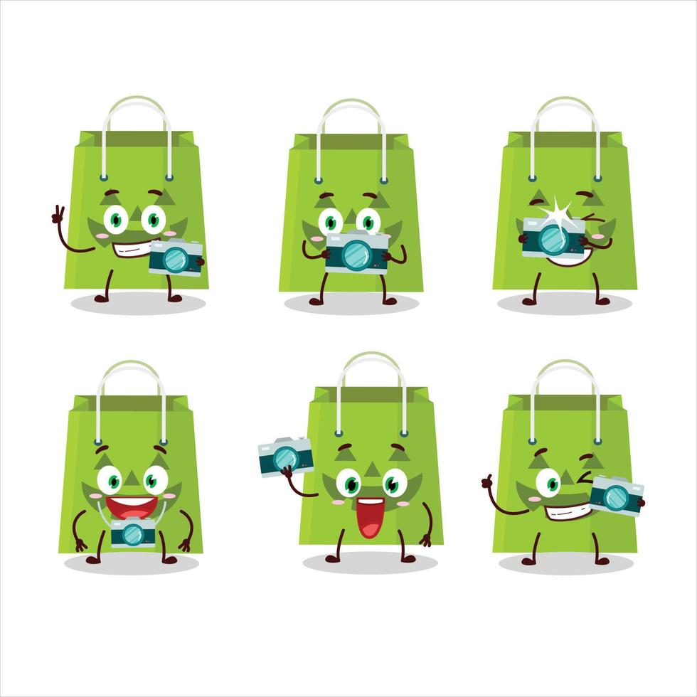 Photographer profession emoticon with halloween tote bag cartoon character vector