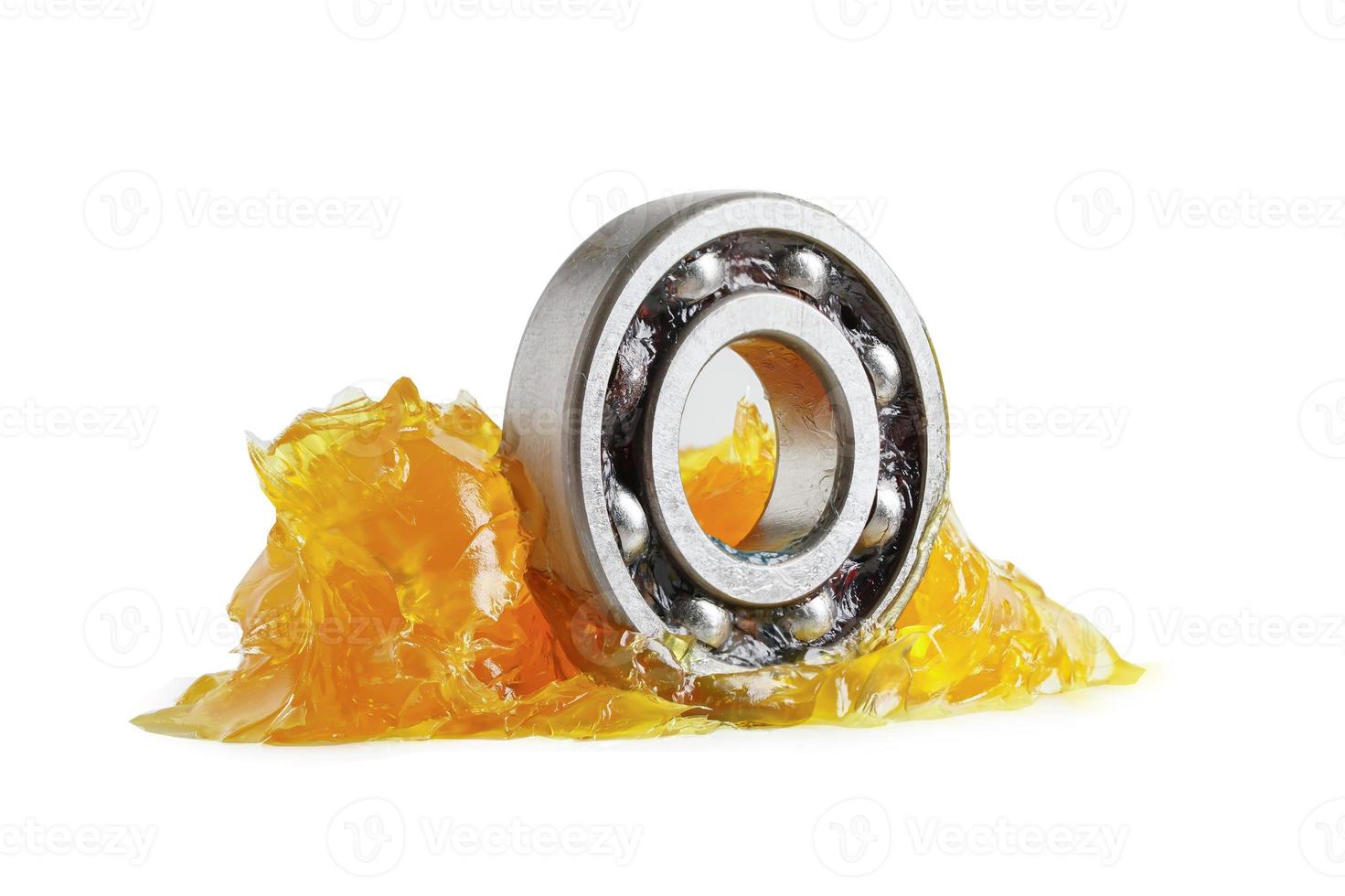 Grease and ball bearing  isolated on white background with clipping path, lithium machinery lubrication for automotive and industrial. photo