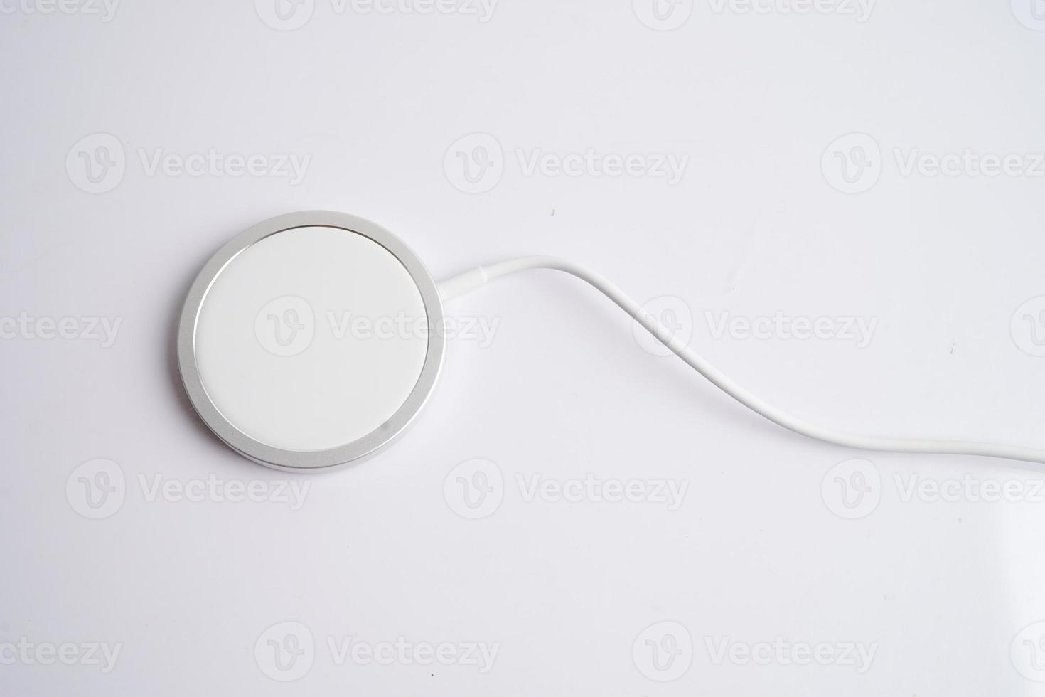 Wireless charger, magnetic charging modern equipment of mobile phone. photo