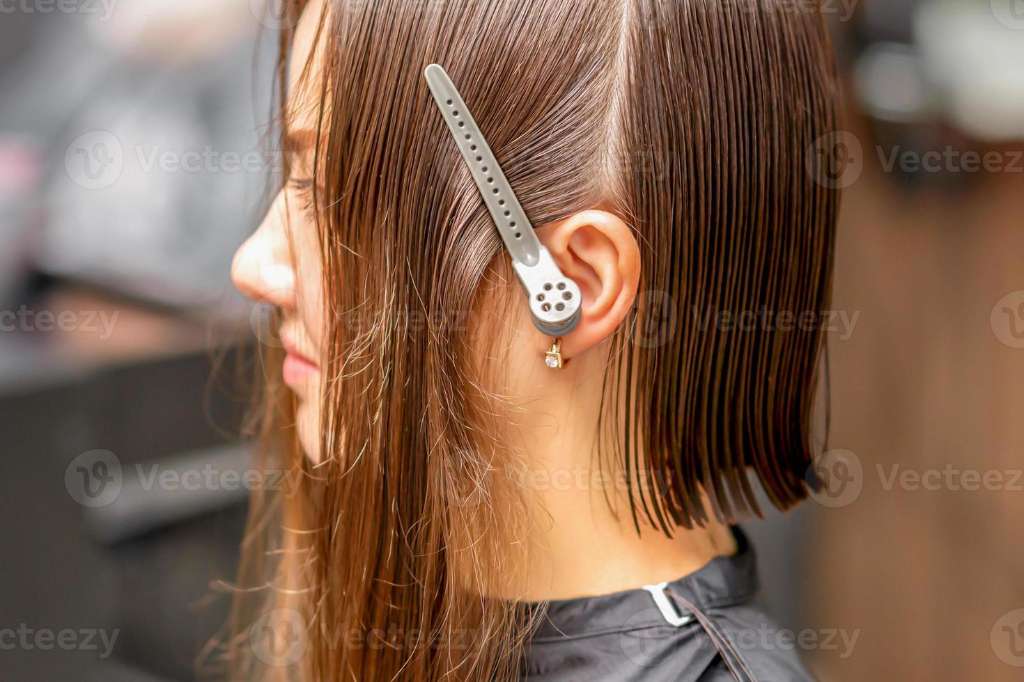 Brunette woman with split hair photo