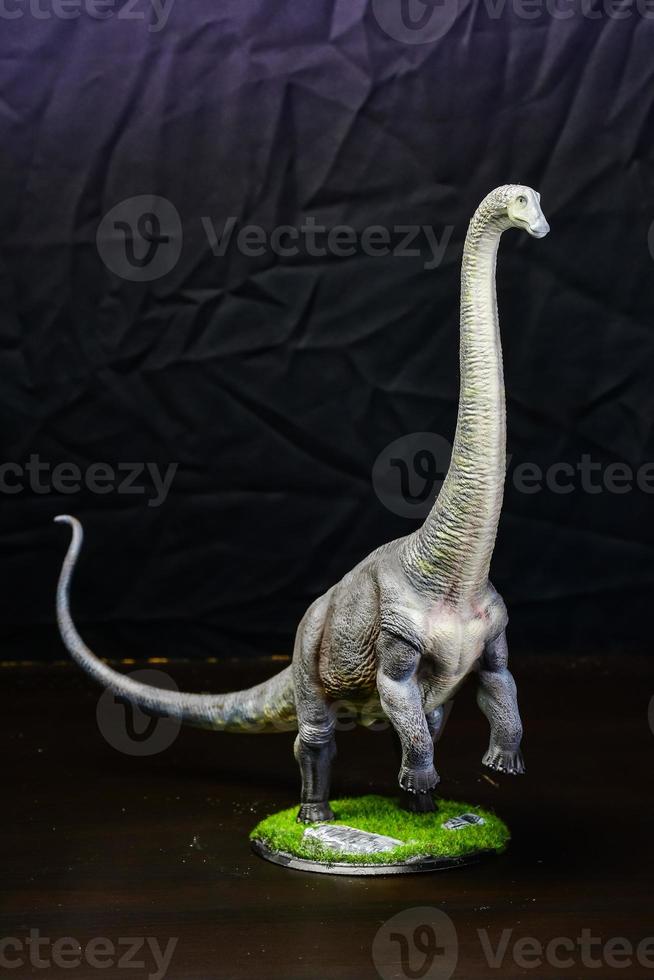 The Brontosaurus dinosaur  in the dark photo