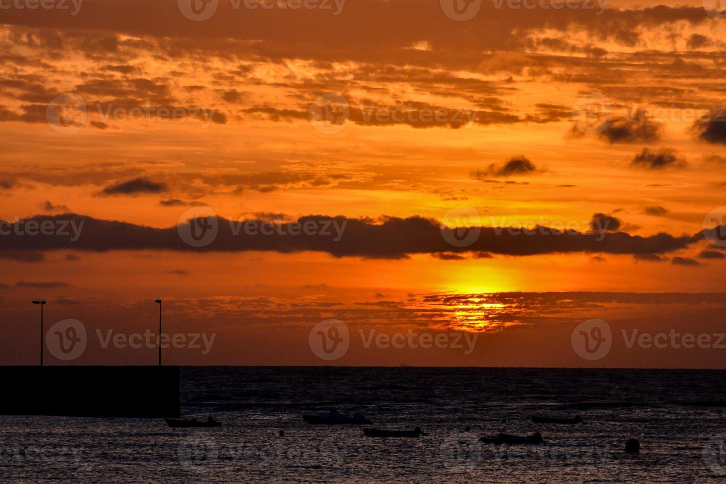 Sunset over the sea photo
