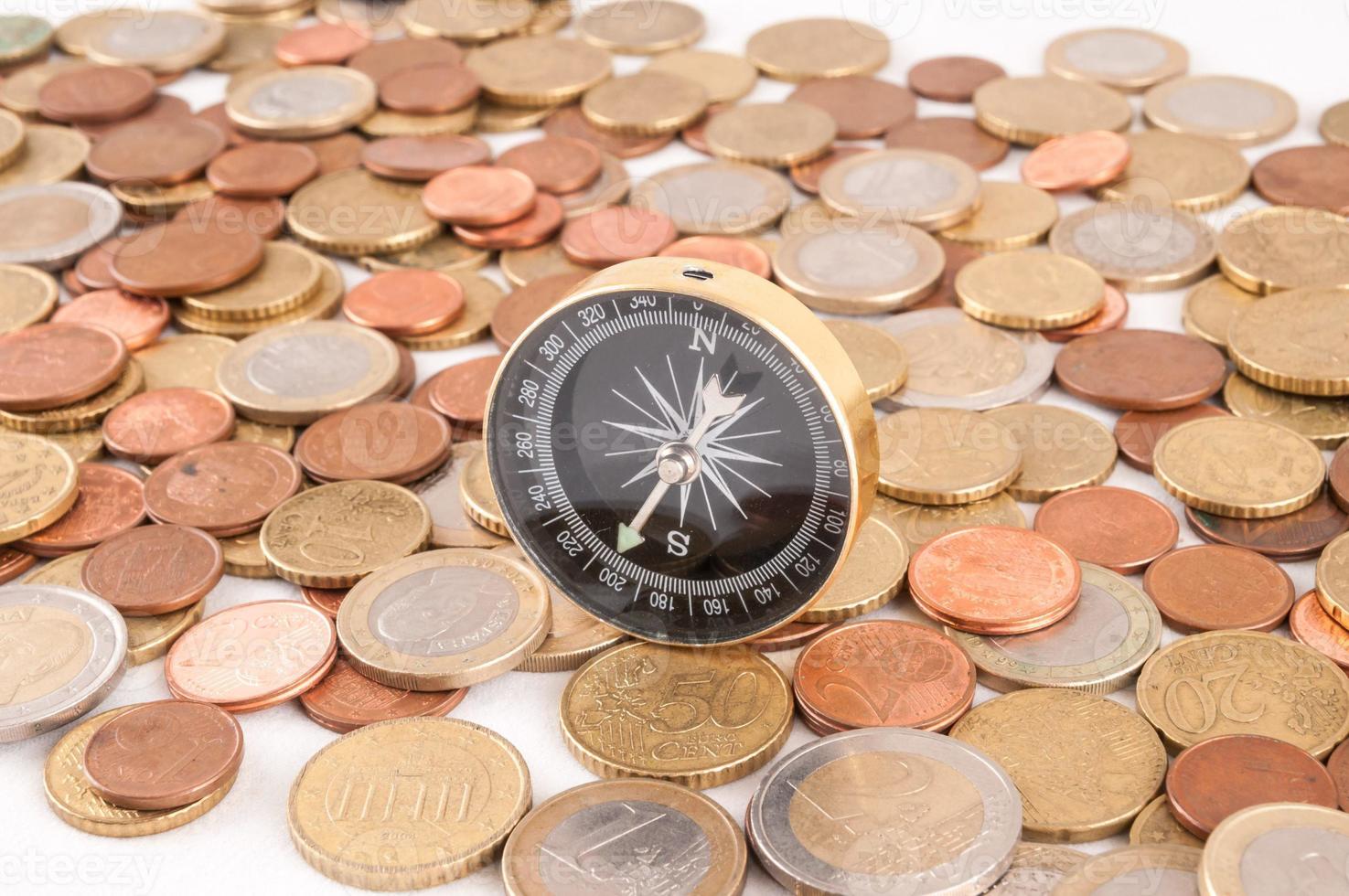 A compass on coins photo