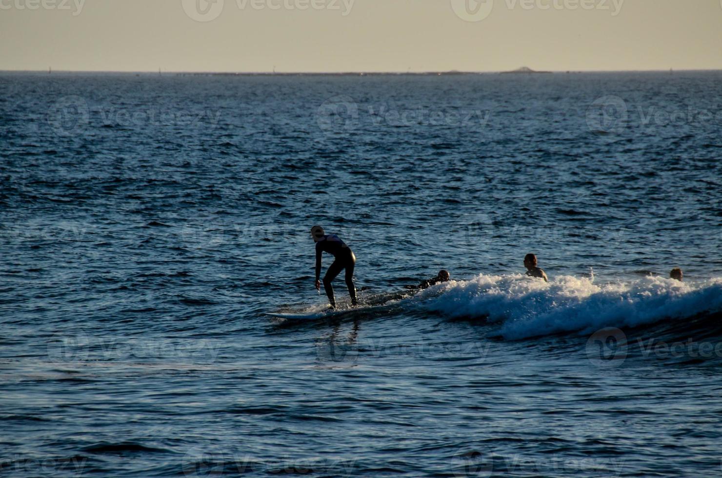 A surfer on a wave photo