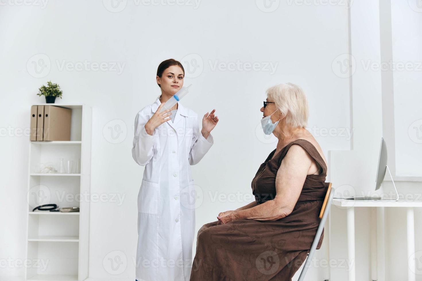 emotional nurse and patient vaccination hospital photo