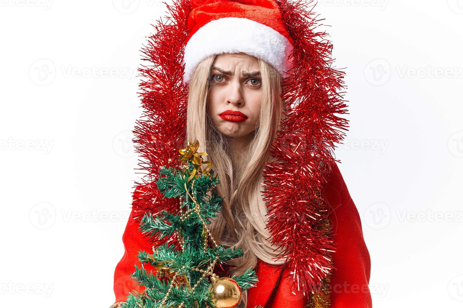 bonito mujer vestido como Papa Noel Navidad árbol juguetes estilo de vida foto
