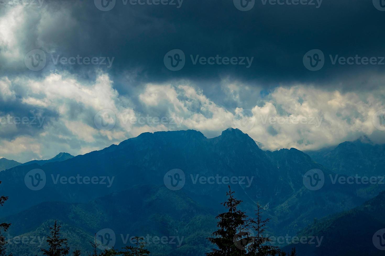 landscape of the Tatra Mountains on a warm summer cloudy holiday day photo