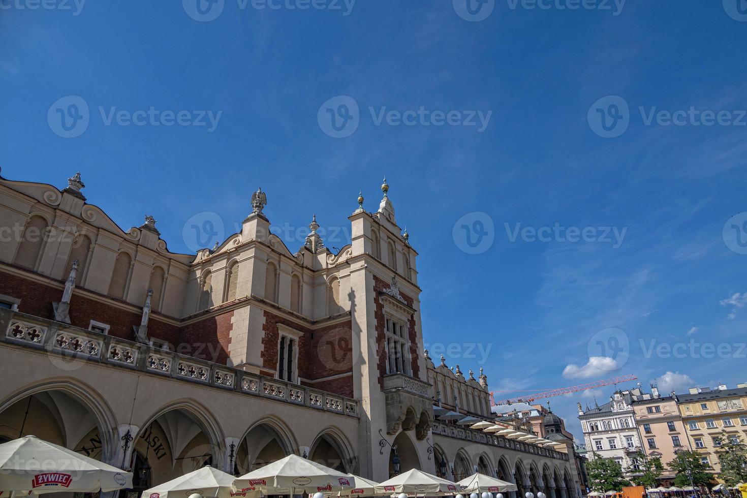 historic old town square in Krakow on a warm summer holiday day photo