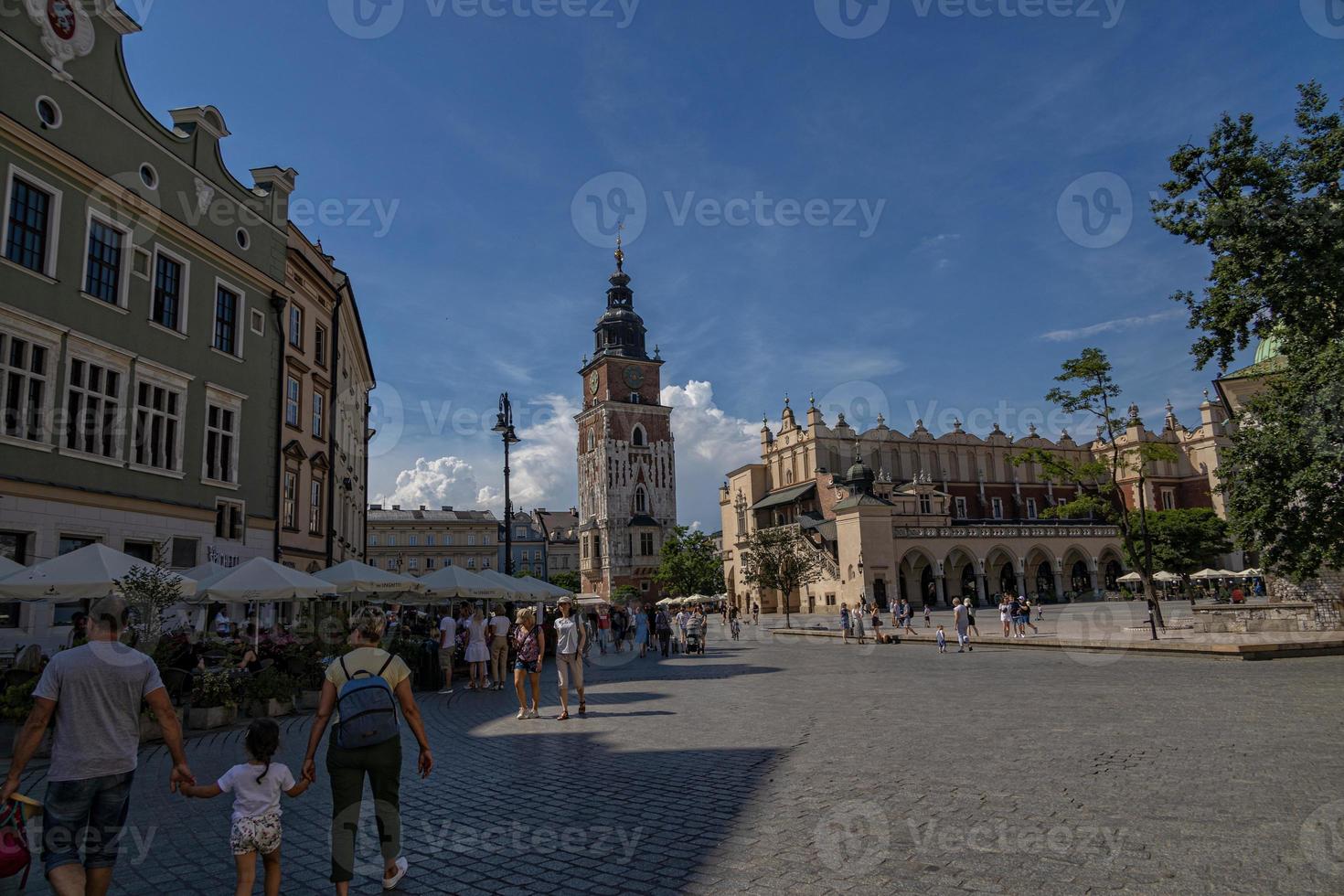 historic old town square in Krakow on a warm summer holiday day photo