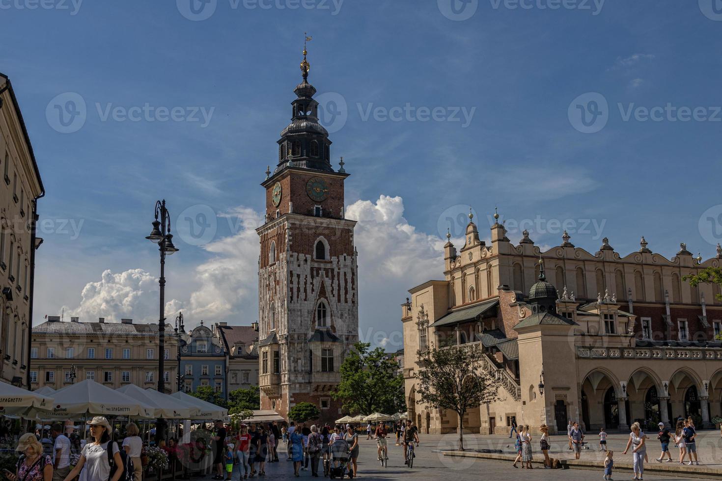 historic old town square in Krakow on a warm summer holiday day photo