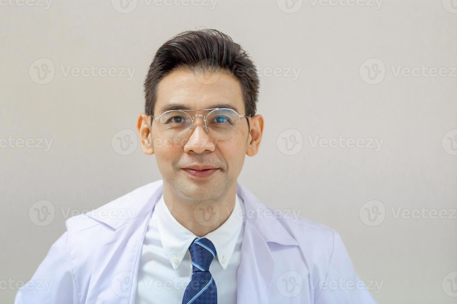 Portrait of Cheerful doctor posing and smiling at hospital, Medical healthcare and doctor service photo