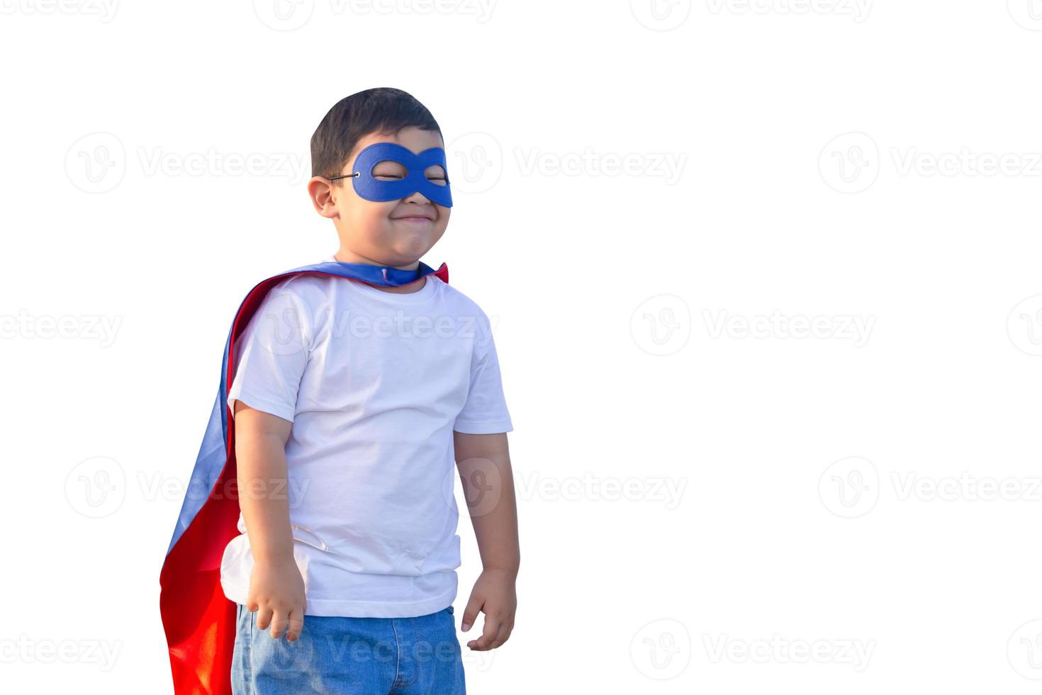 Portrait of adorable kid boy with clipping path having fun on white background. Little child play superhero photo