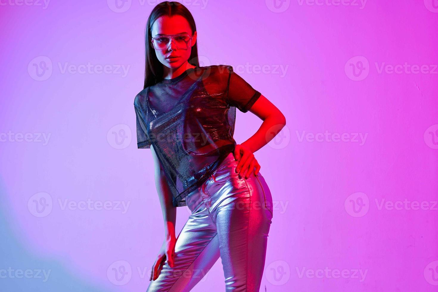 woman in fashion clothes Cosmetics disco charm neon light studio photo