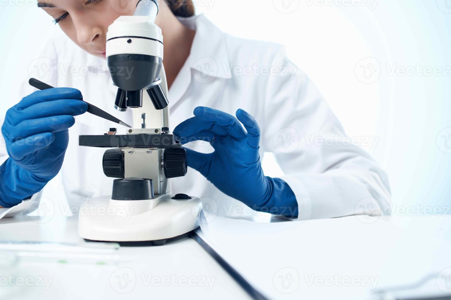 woman laboratory assistant microscope research technology experiment photo