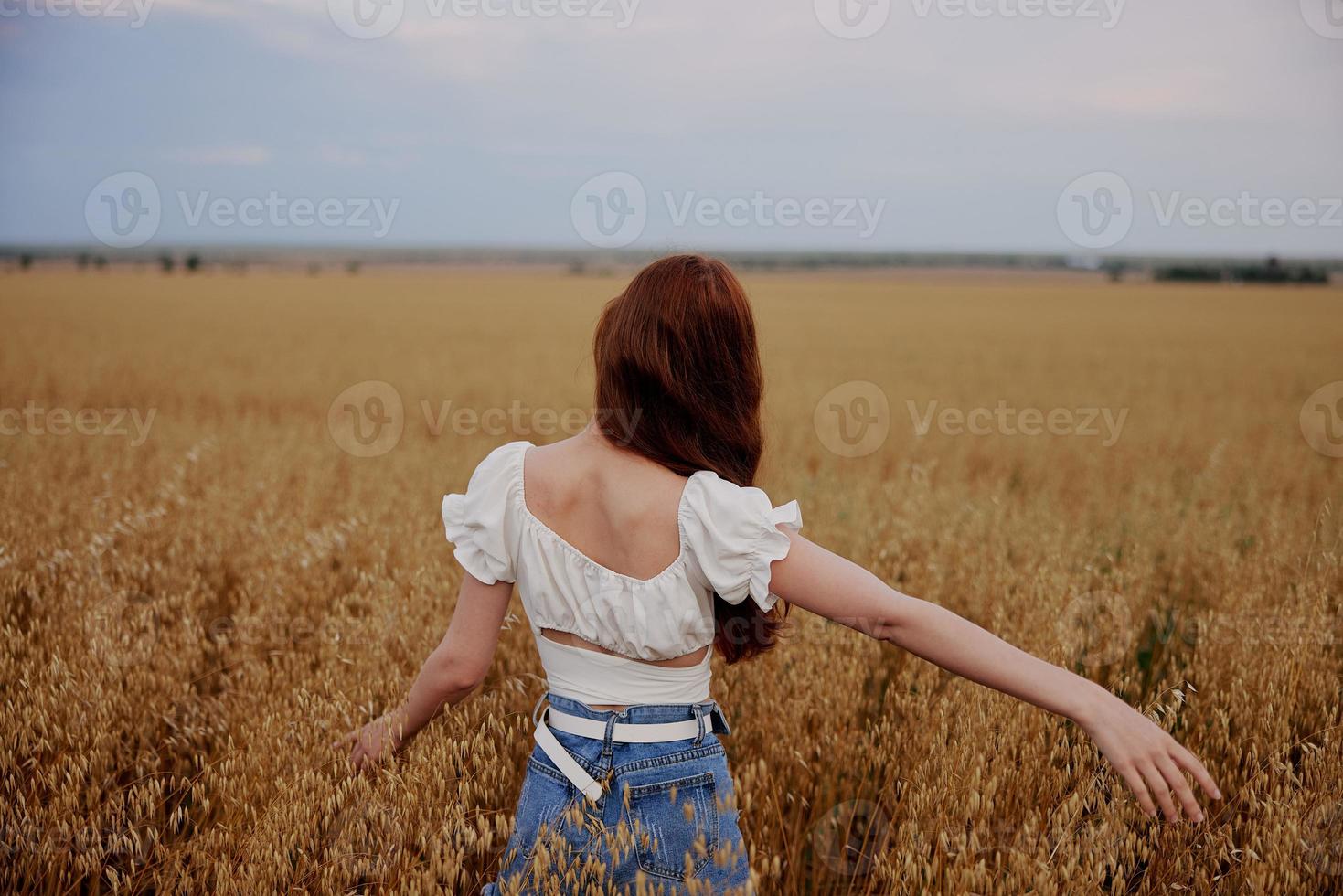 woman in the field countryside nature freedom walk photo