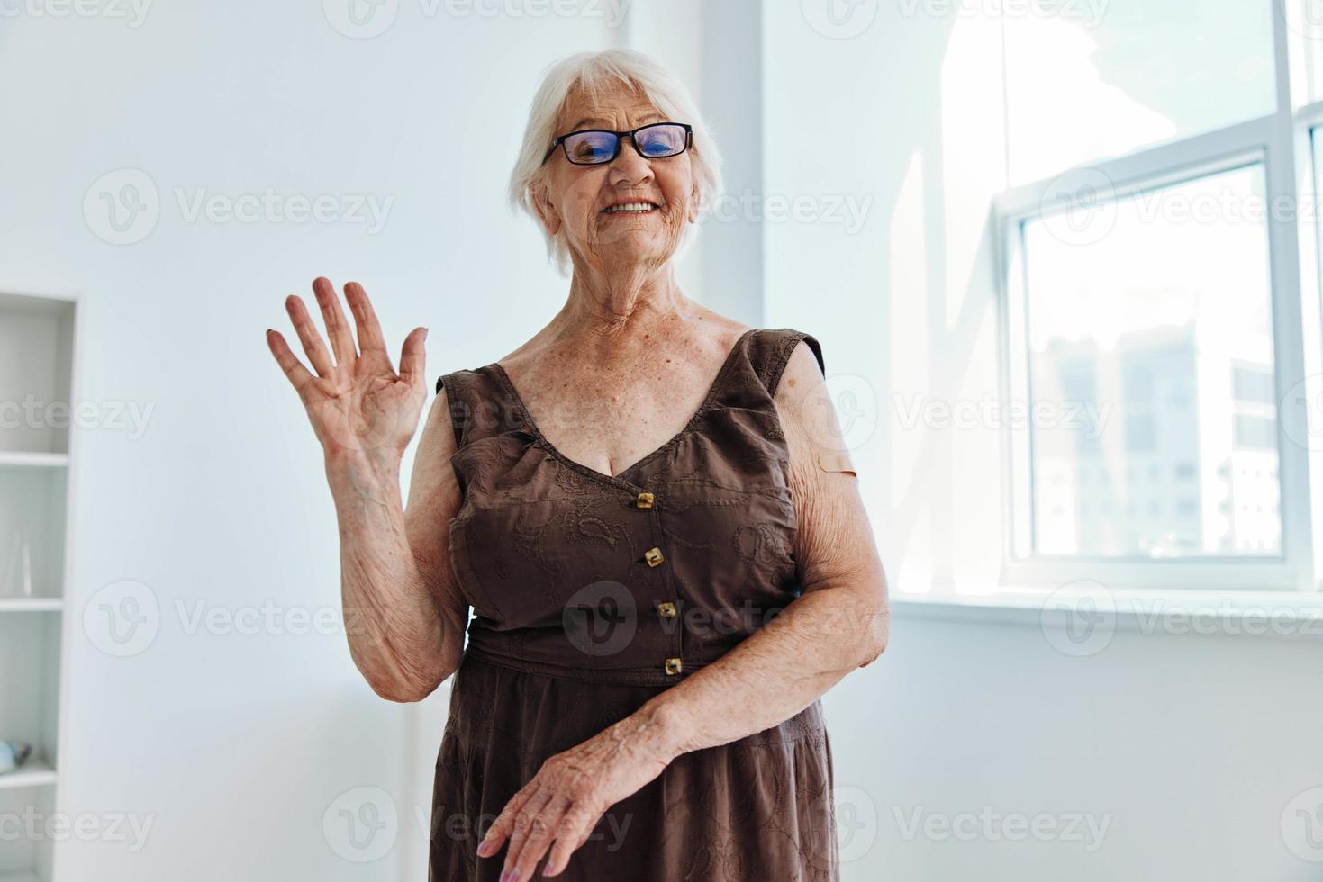 elderly woman hand injection covid-19 passport health care photo