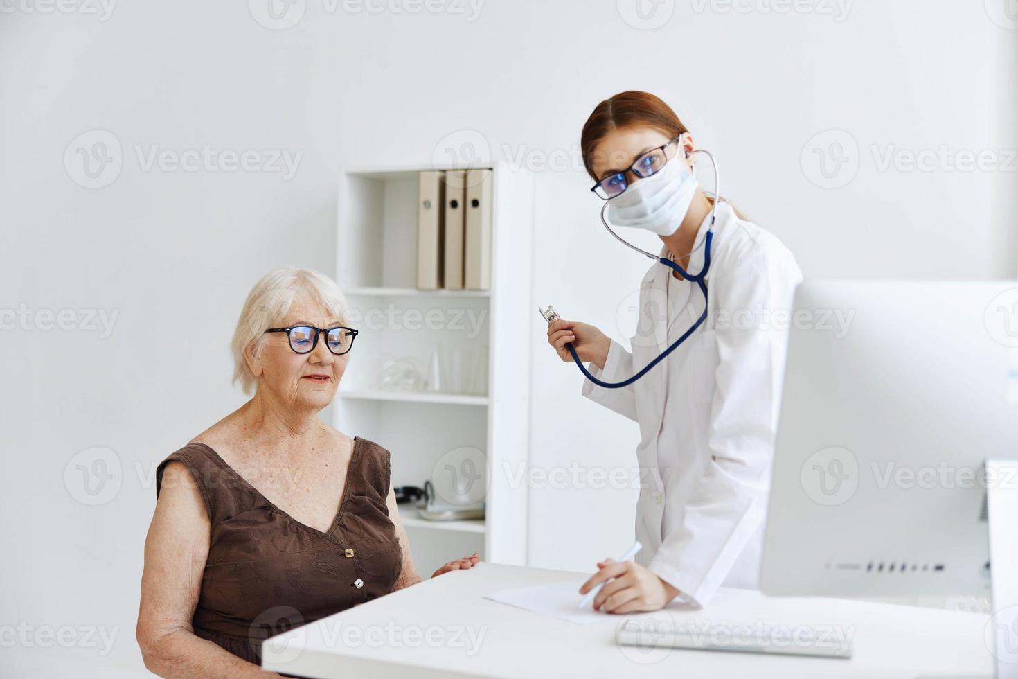 female doctor stethoscope in hand health care photo