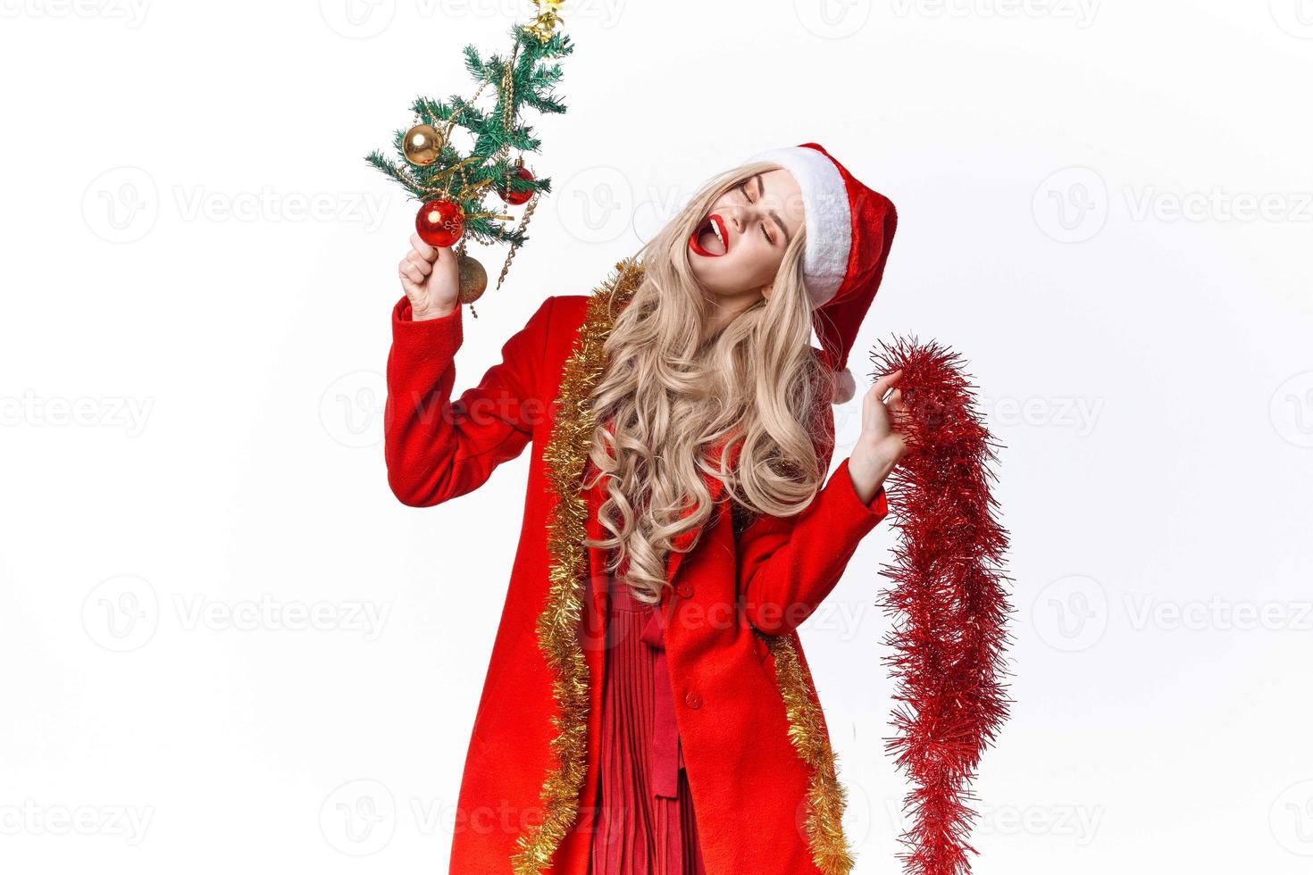 bonito mujer en Papa Noel disfraz Navidad árbol con juguetes decoración Moda foto