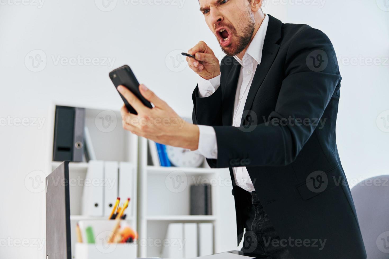 office worker office work documents with a phone in hand boss photo