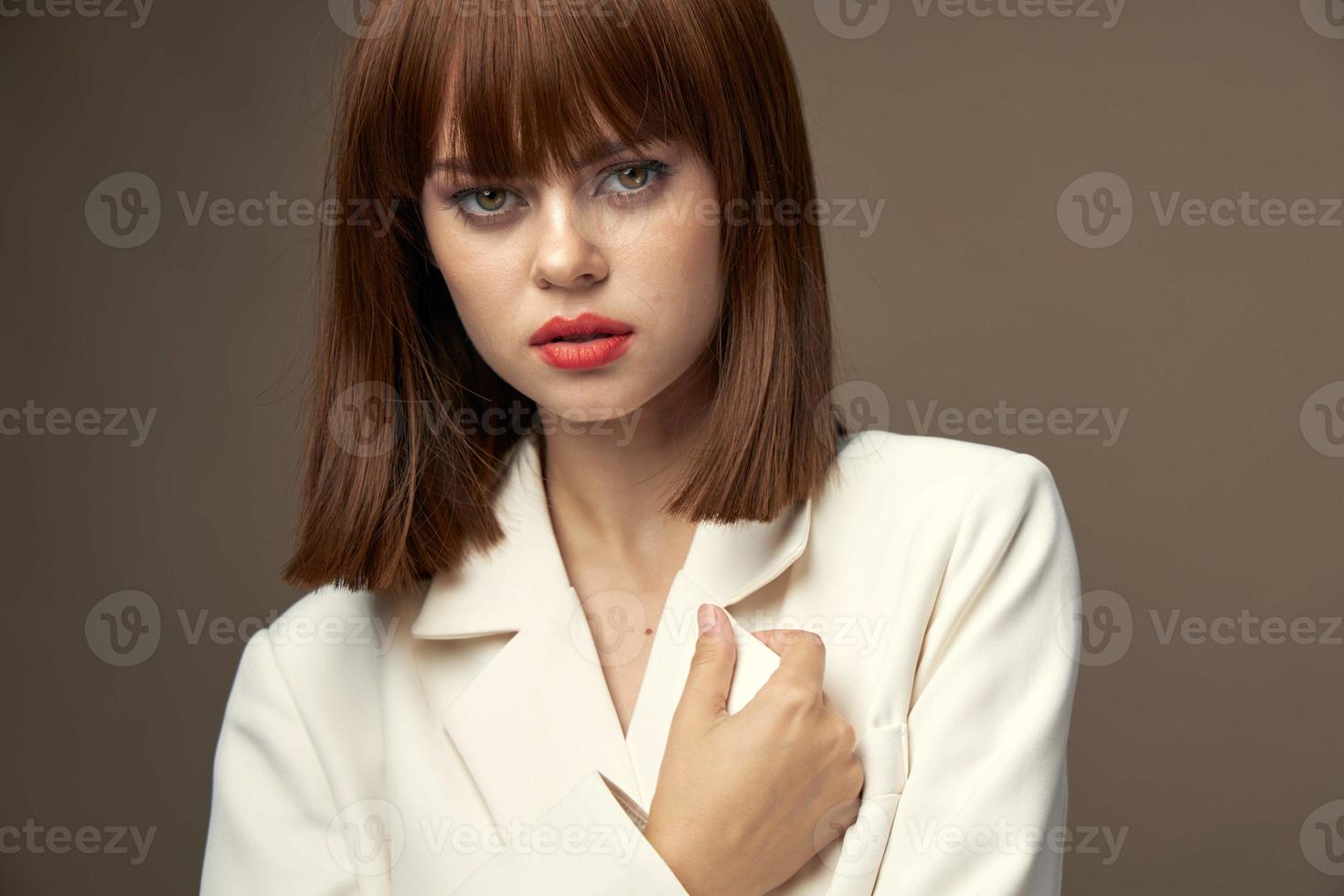 Attractive woman in dress gesticulate with hands photo