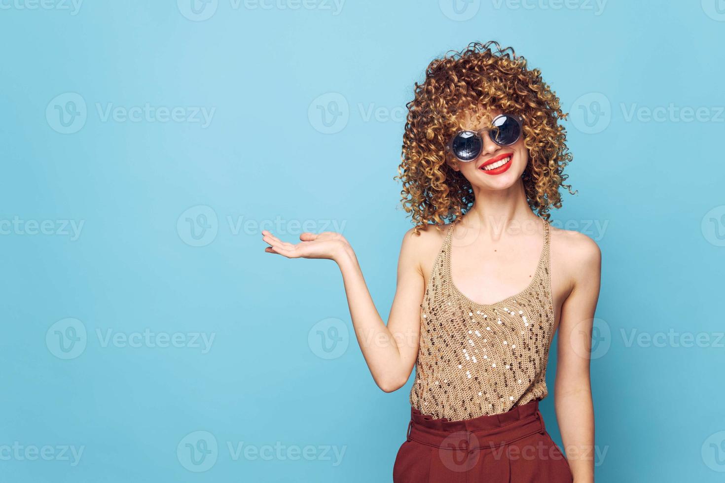 Sexy model Smile Curly Hair Palm Up Studio Copy Space sequin shirt photo
