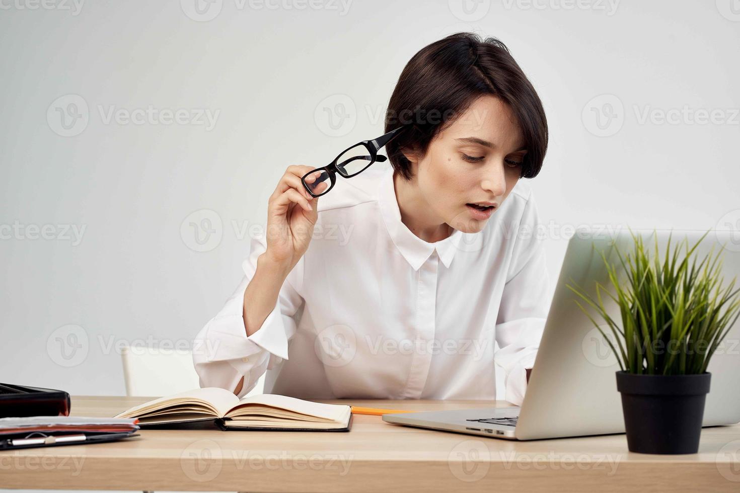 woman in costume in front of laptop with glasses self-confidence Studio Lifestyle photo