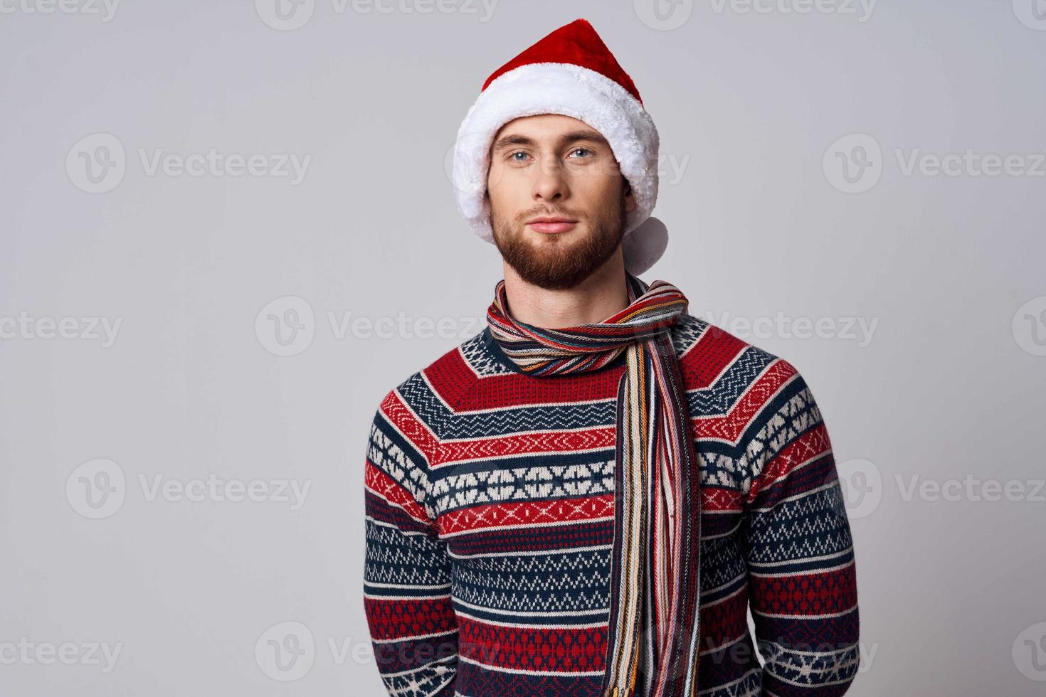 man in Christmas clothes holiday New Year Studio photo