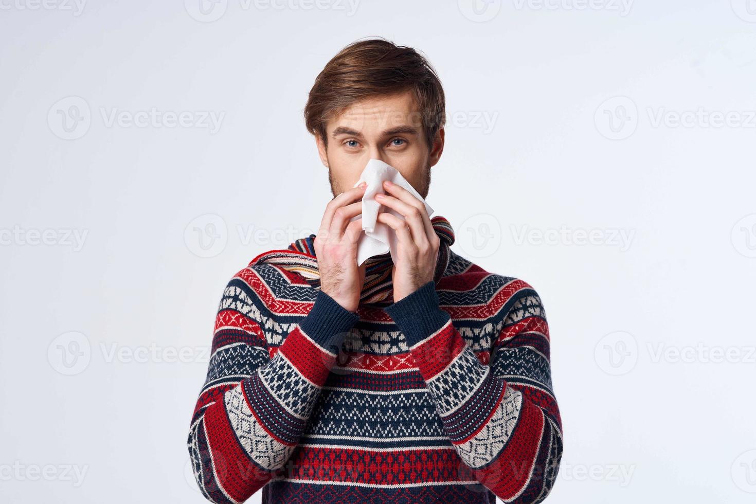 sick man sweater health problems handkerchief flu infection light background photo