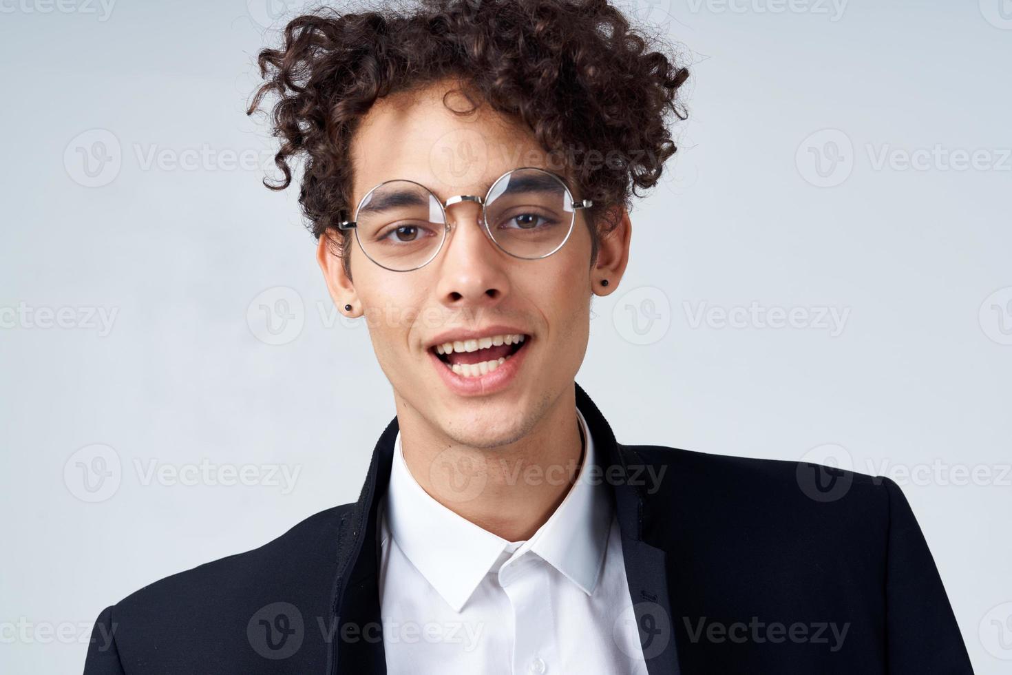 funny curly guy with glasses suit fashion official 22313230 Stock Photo