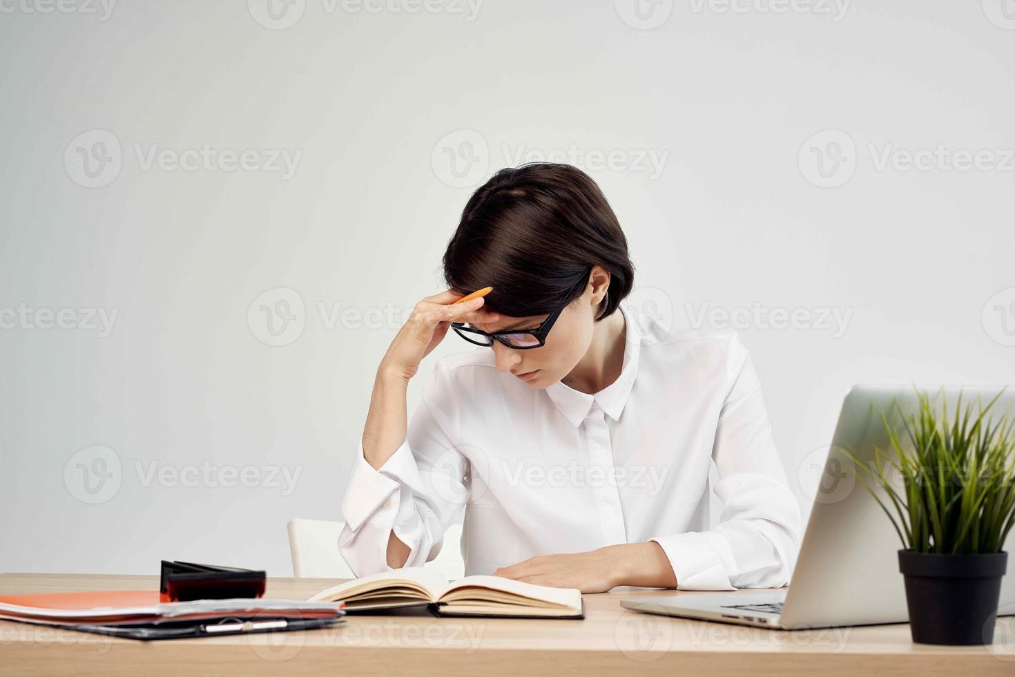 female manager in the office documents Professional Job light background photo