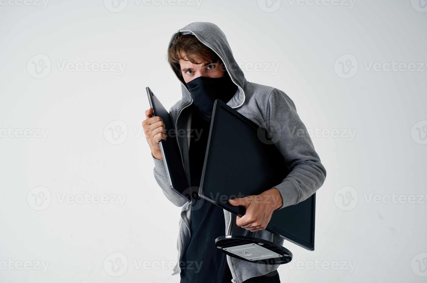 masked man hooded head hacking technology security isolated background photo