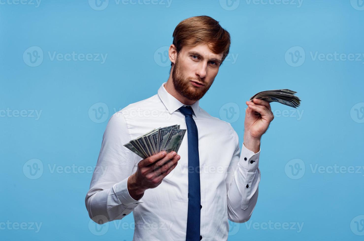 business man wads of money self confidence financial lifestyle photo