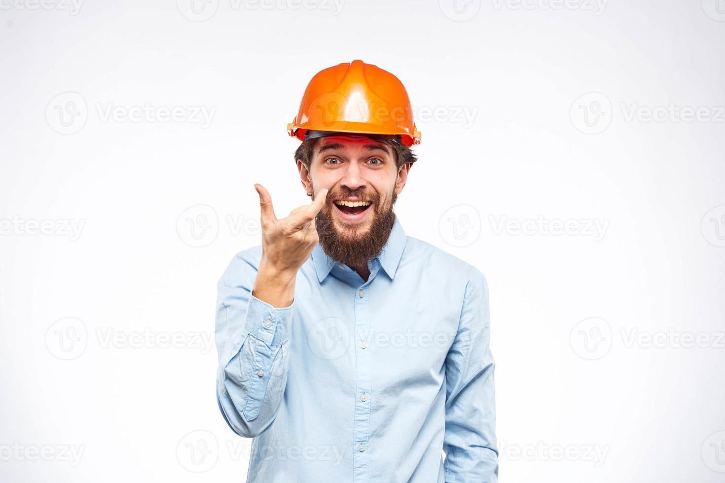 Emotional workers in orange paint safety in construction industry official photo