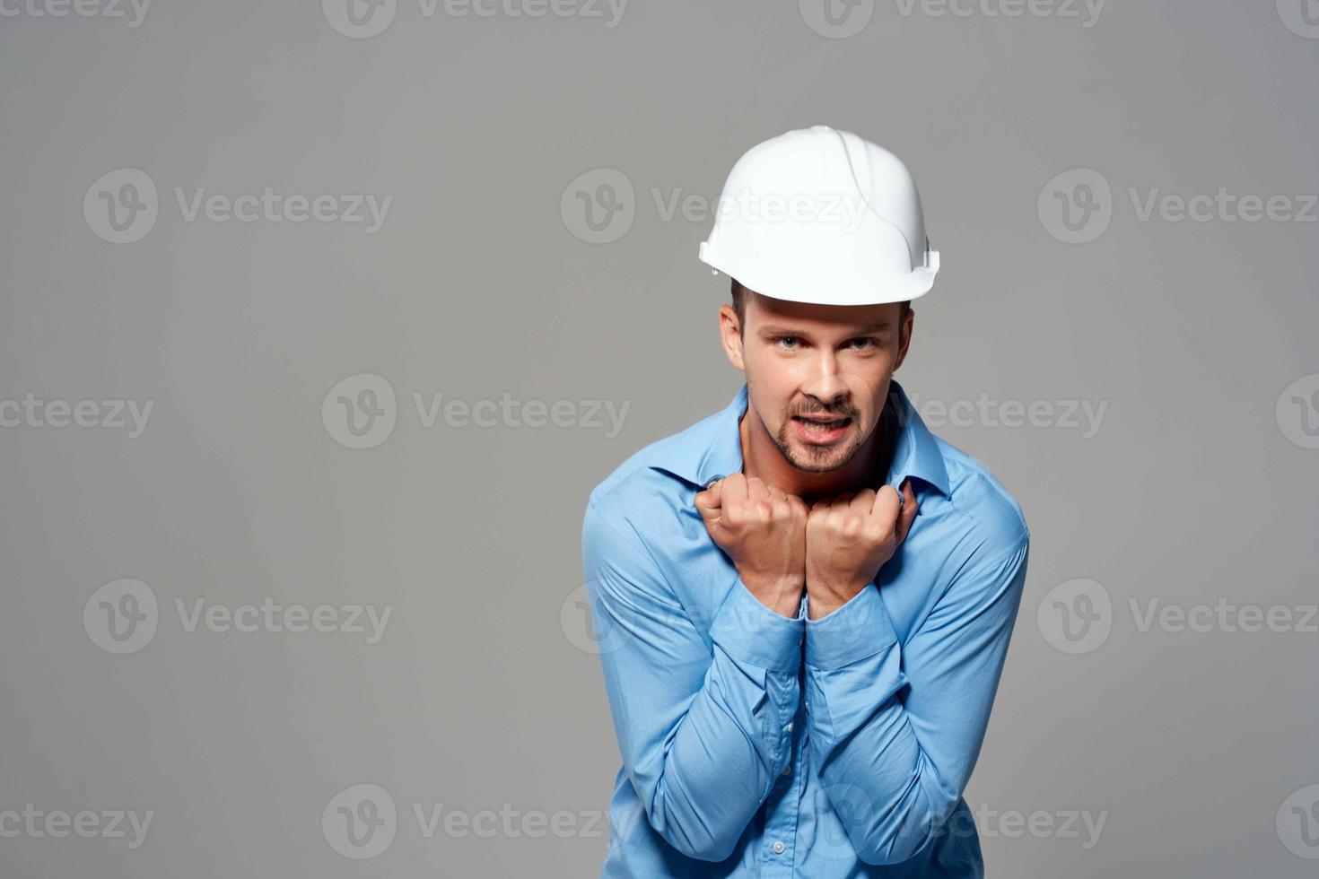 worker male engineer in white helmet emotions Professional photo