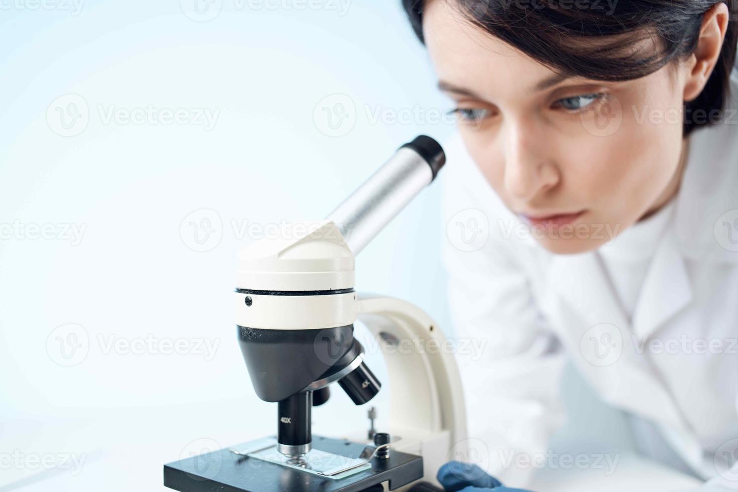 laboratory assistant in a white coat research technology analysis