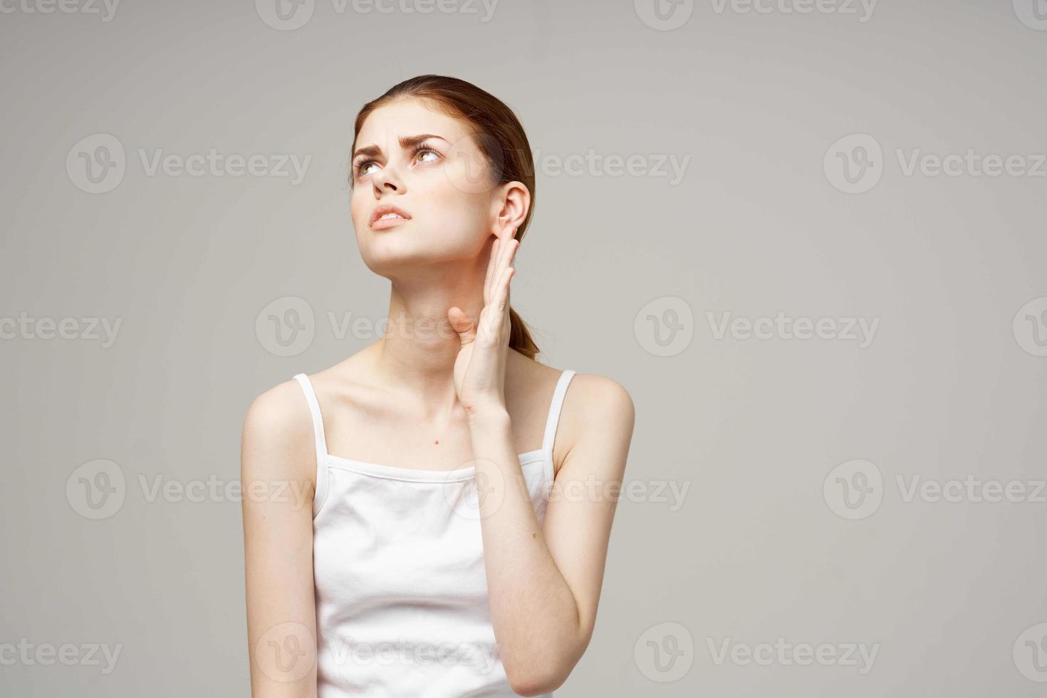 woman ear pain otitis media health problems infection light background photo