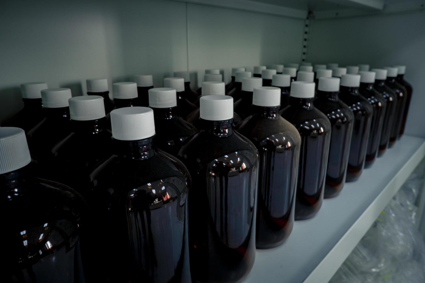 Human body sample bottle for combination DNA, human cloning project. The photo is suitable to use for medical and laboratory background and content media.