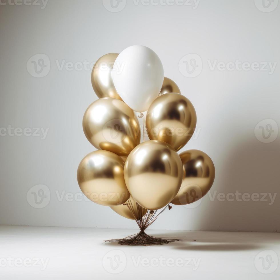 Gold and white balloon on white background with copy space. photo