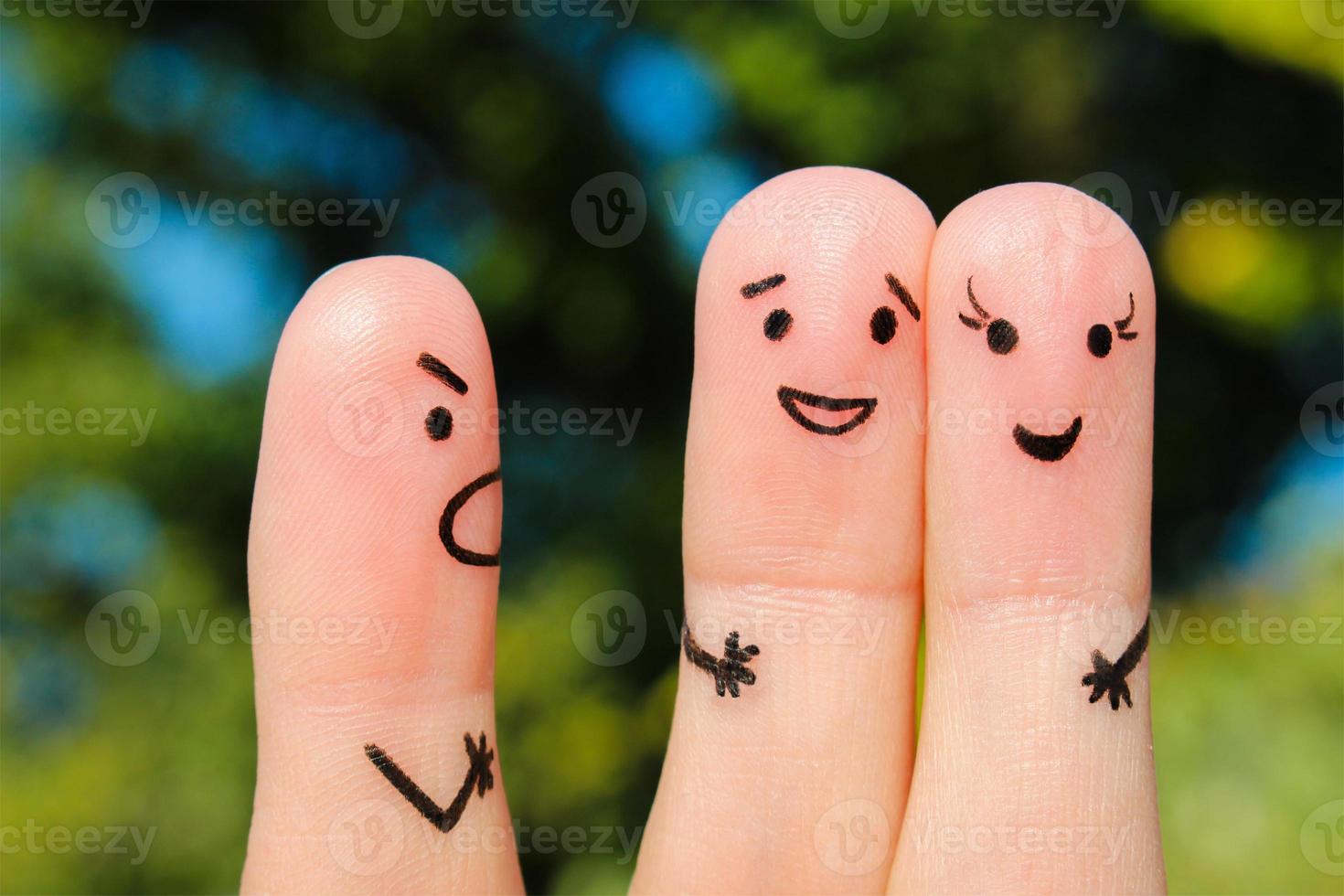Finger art of people. The concept of a man scolds a couple, and they laugh. photo