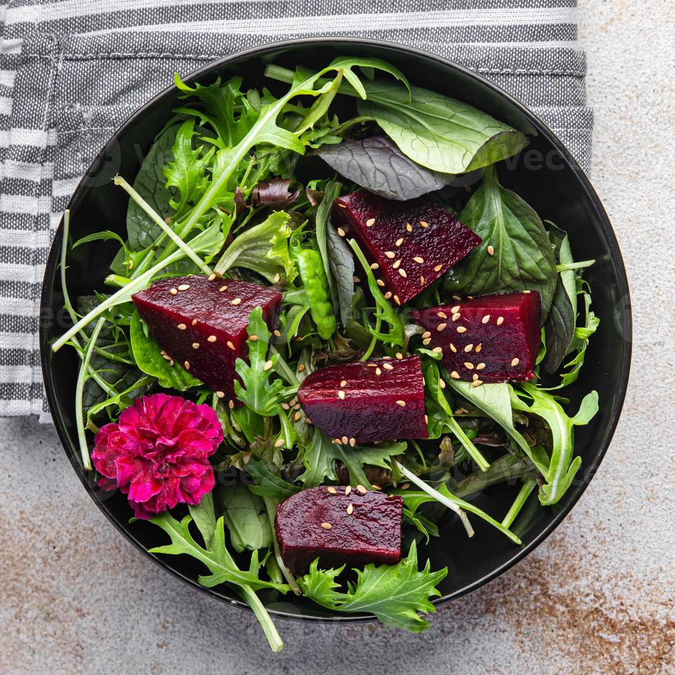 salad beet slice fresh beetroot mix green lettuce healthy meal food snack on the table copy space food background rustic top view keto or paleo diet veggie vegan or vegetarian food photo