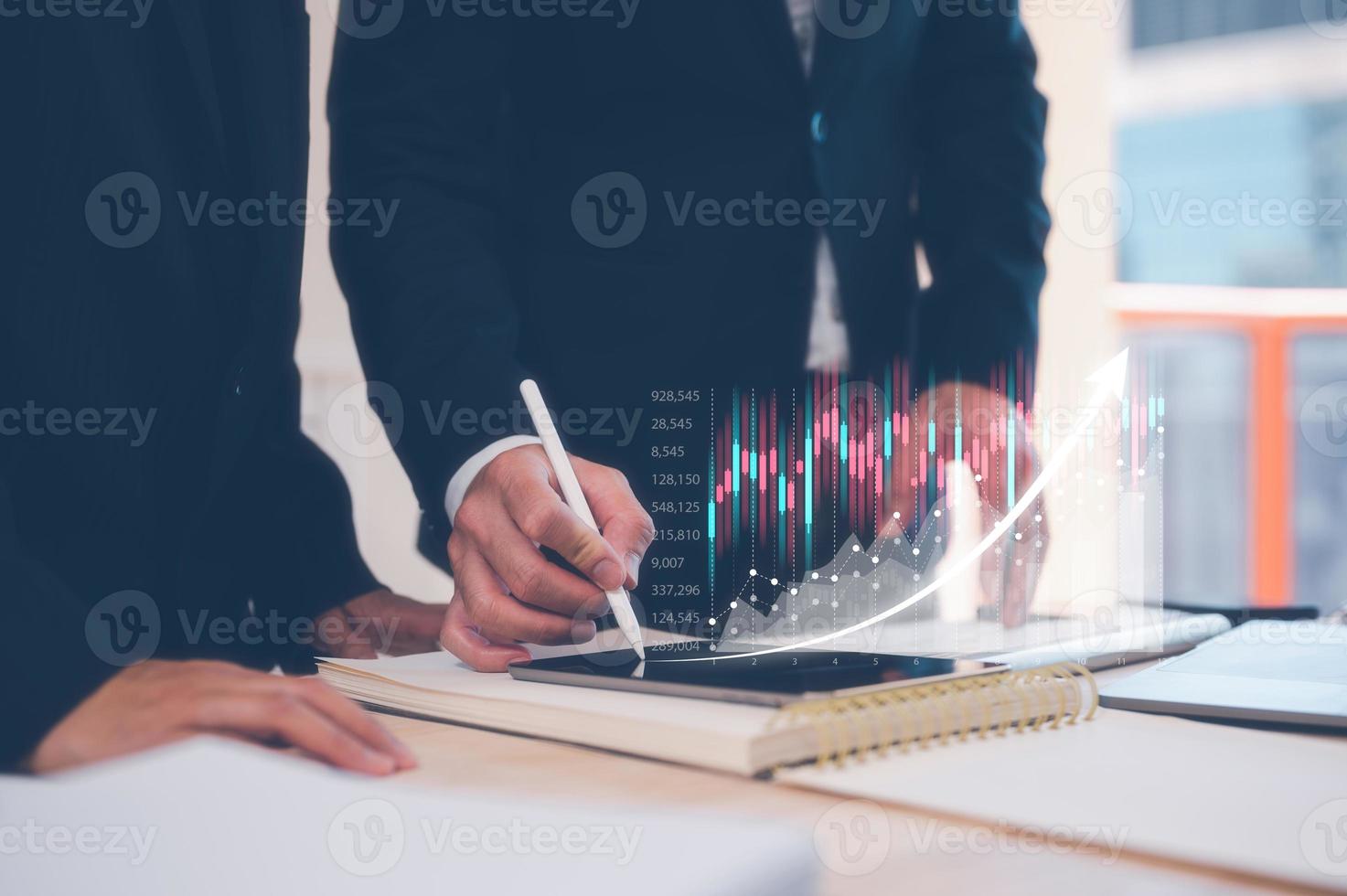 investment strategy, financial business plan concept, business partner, colleagues, staff meeting in office  on table with virtual graph, data analysis profit growth. photo