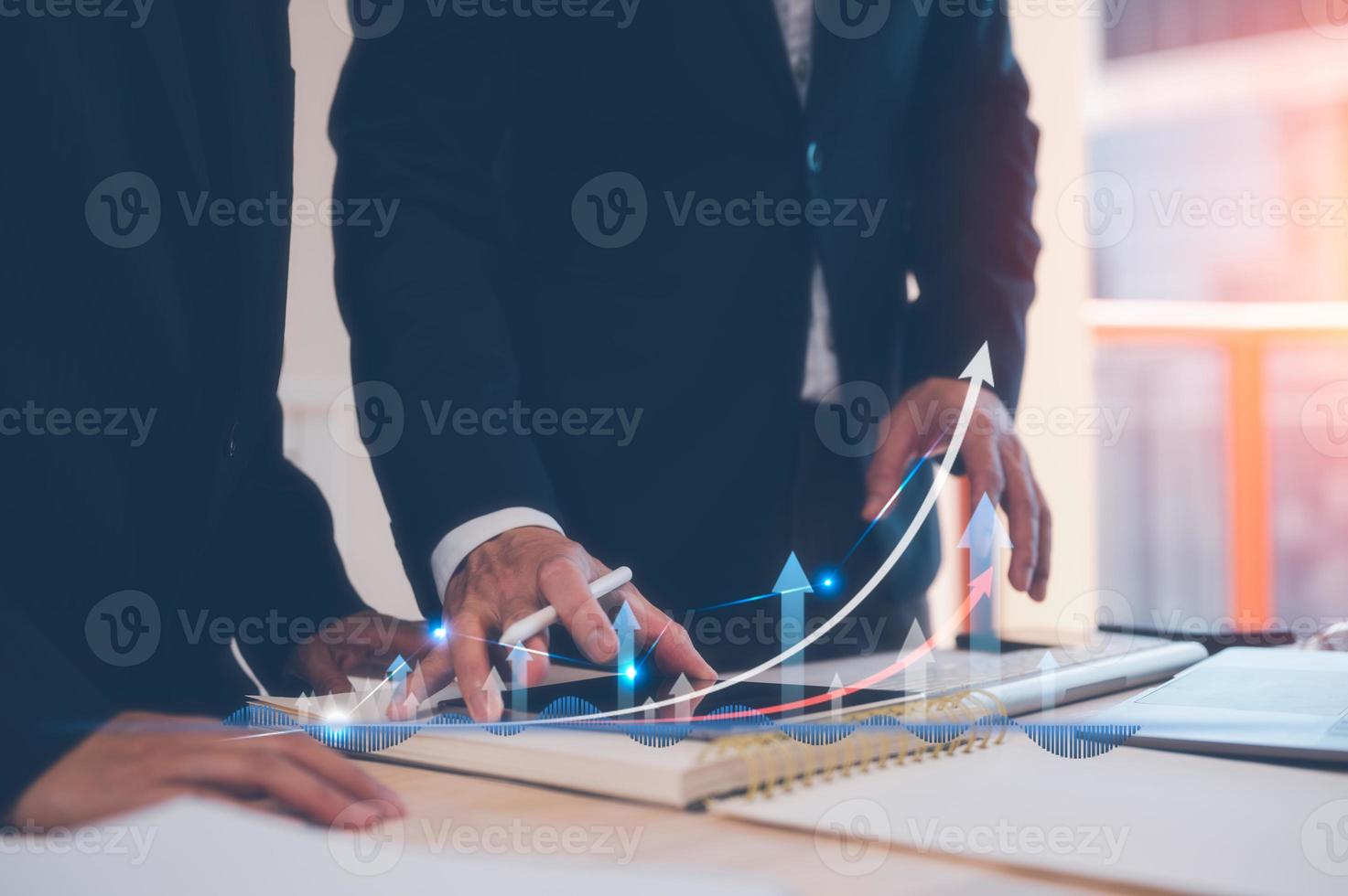 investment strategy, financial business plan concept, business partner, colleagues, staff meeting in office  on table with virtual graph, data analysis profit growth. photo