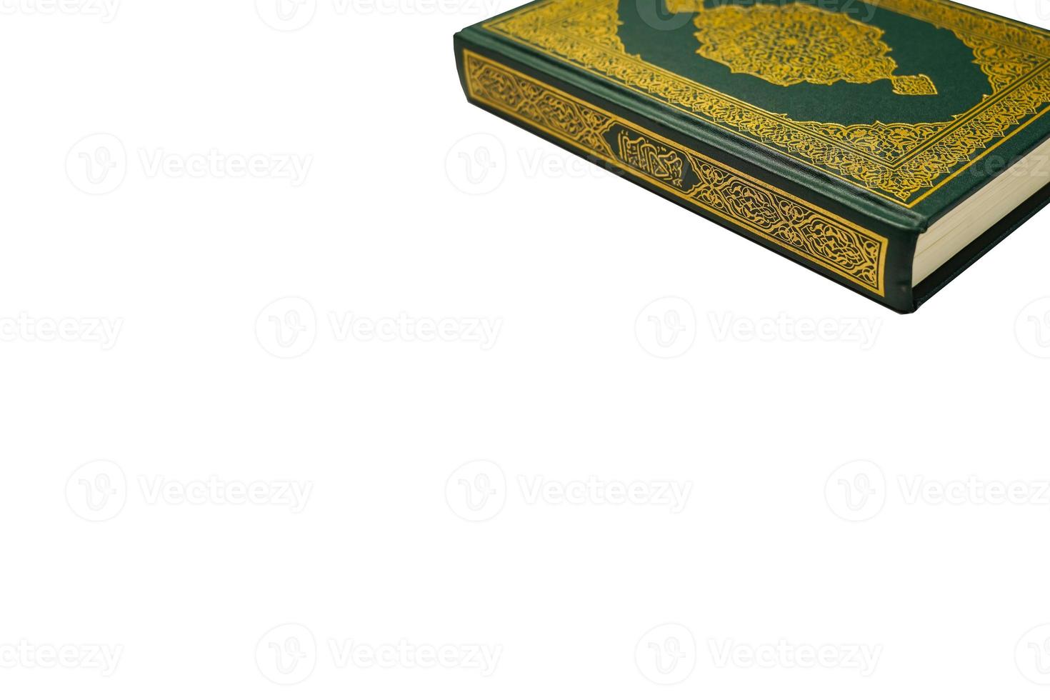 The Holy Al Quran with written arabic calligraphy meaning of Al Quran and rosary beads or tasbih on white background, isolated with copy space. photo