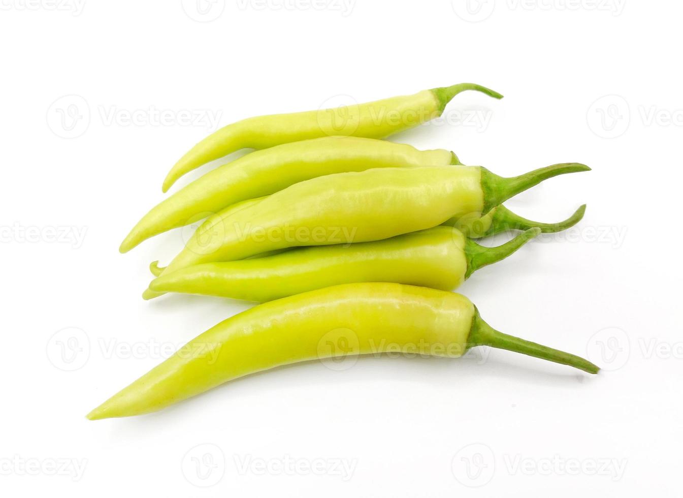 Group of green pepper isolated on white background with clipping path or make selection. Fresh vegetable, spicy taste harvest and ingredient for cooking food. photo