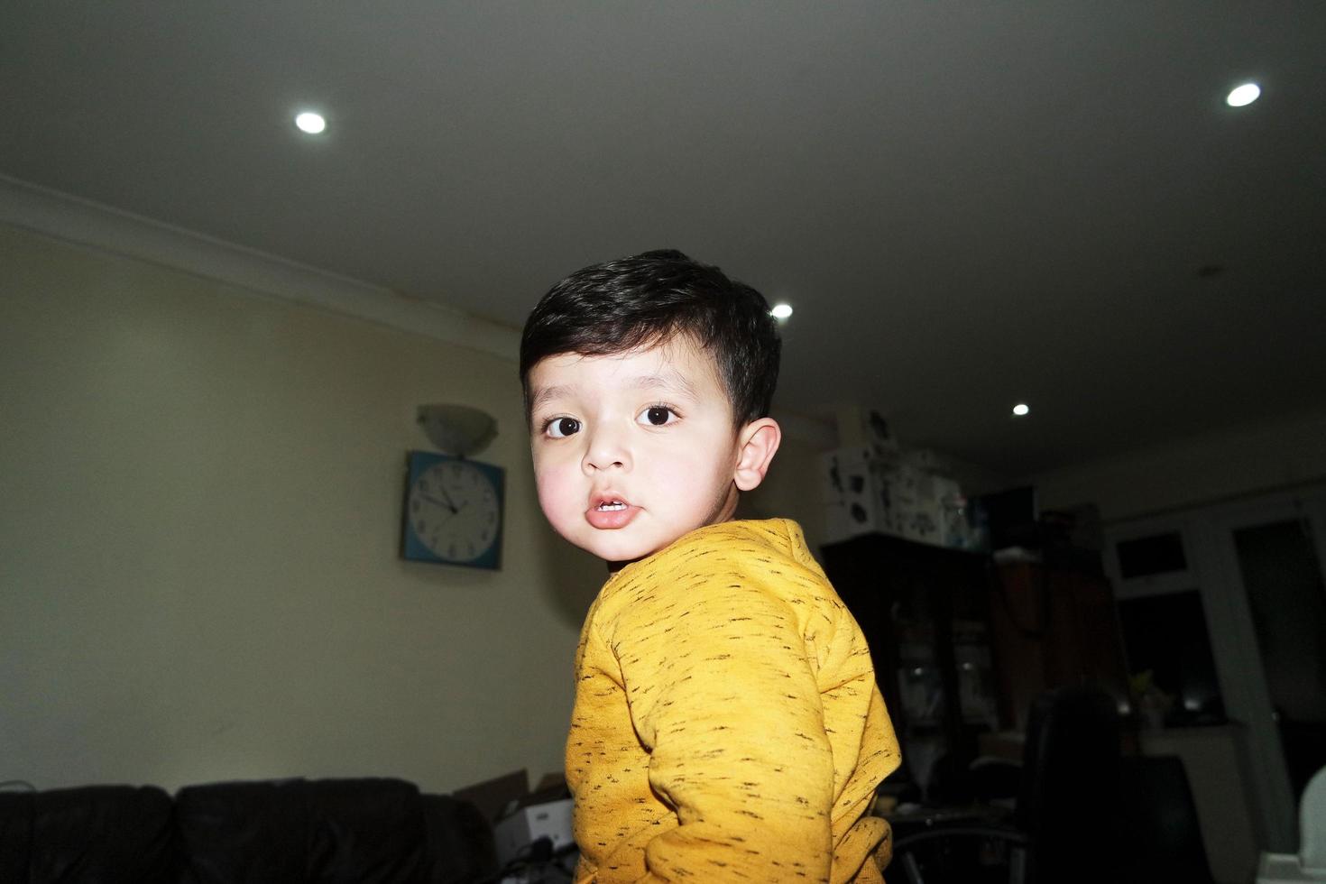 Cute Asian Pakistani Baby, Ahmed Mustafain Haider is Posing at Home. Originally he is from Pakistan but Live at Luton England UK. Image was Captured on 02-April-2023 photo