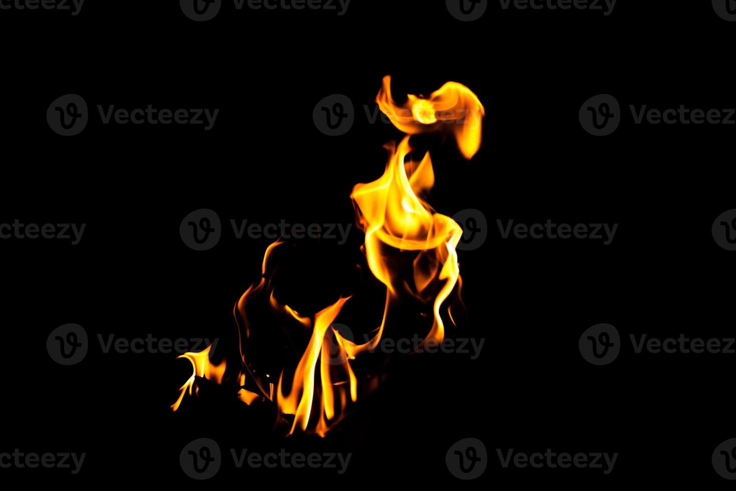 Fire flame texture. Burning material backdrop. Burn effect pattern. Blaze and torch wallpaper. Heat and haze backdrop. photo