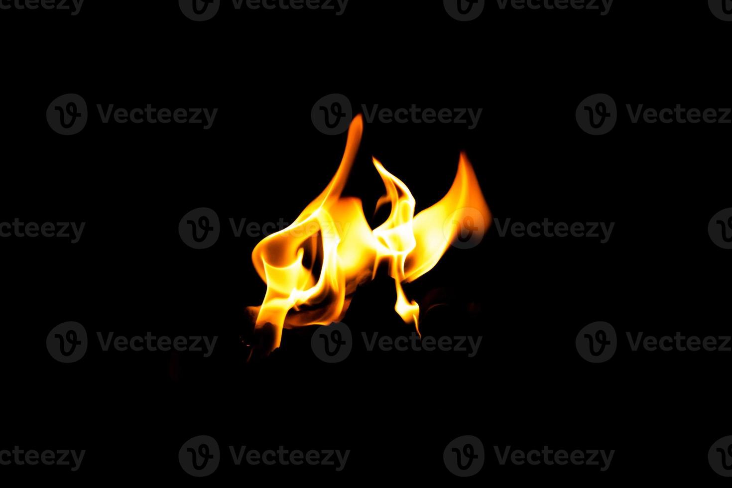 Fire flame texture. Burning material backdrop. Burn effect pattern. Blaze and torch wallpaper. Heat and haze backdrop. photo